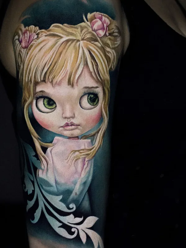 Blythe doll tattoo with blonde hair and green eyes