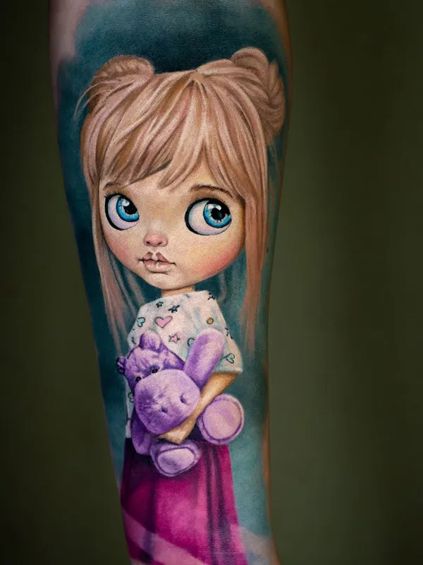 Realistic tattoo of a doll-like girl with big blue eyes holding a purple stuffed hippo